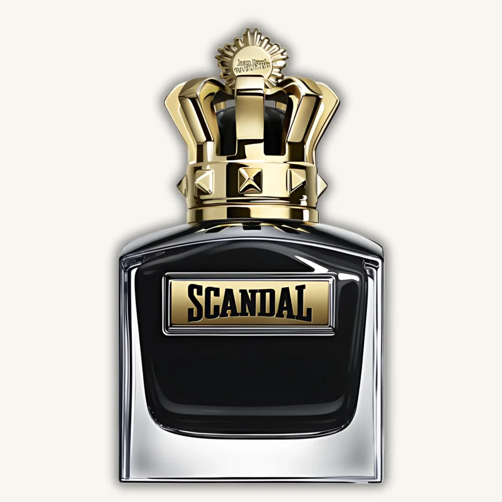 Frasco negro con corona dorada del perfume Scandal de Jean Paul Gaultier, estilo lujoso y llamativo.