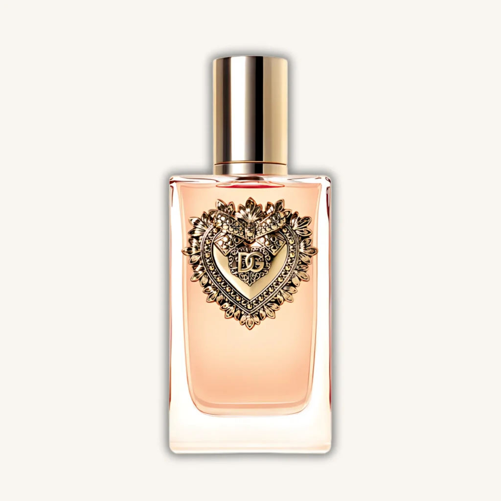Perfume Devotion de Dolce & Gabbana con diseño dorado y ornamentado, fragancia femenina dulce y cálida.