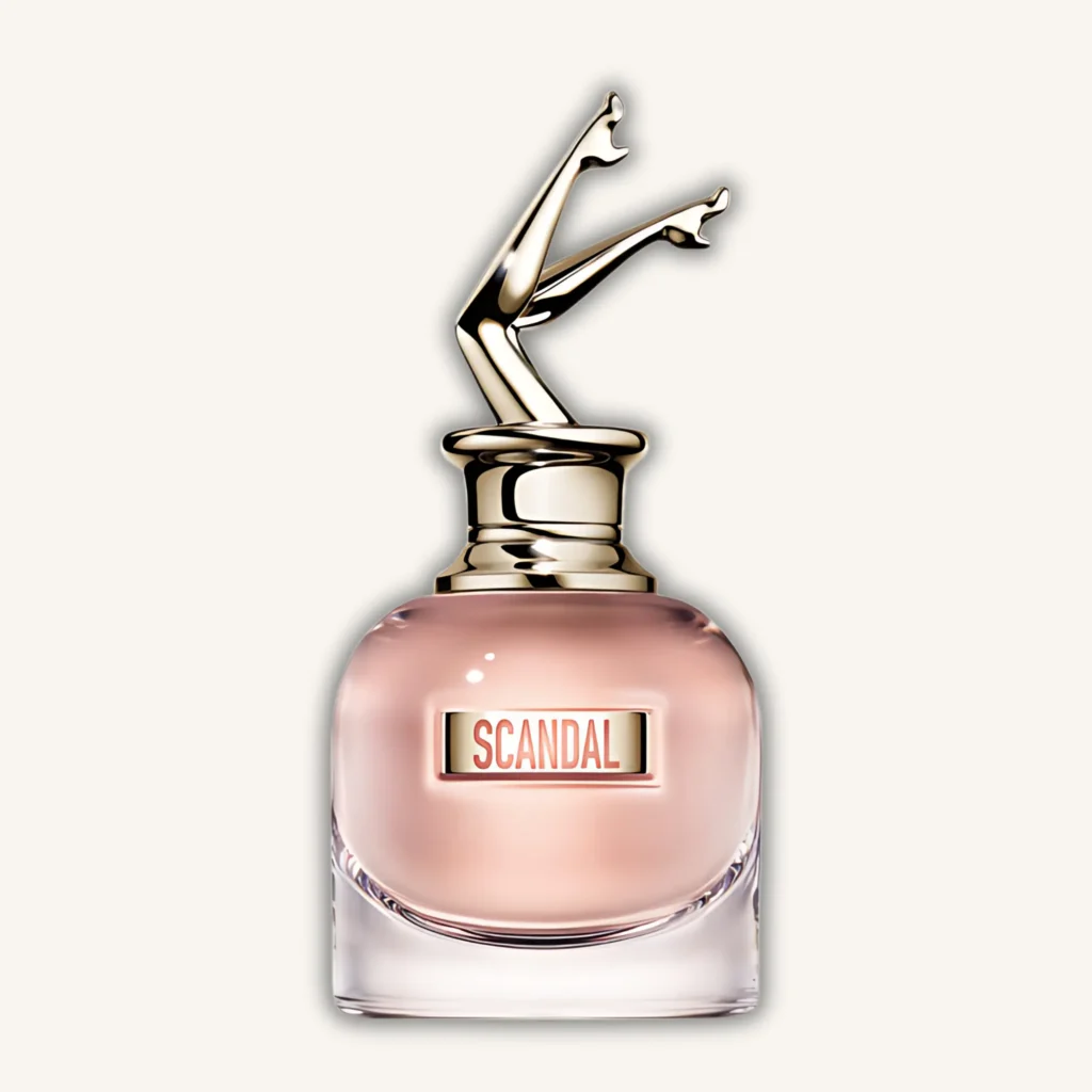 Frasco del perfume Scandal EDT de Jean Paul Gaultier para mujer con tapa en forma de piernas doradas, aroma dulce y floral con toque amielado.